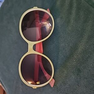 Round green and pink sunglasses